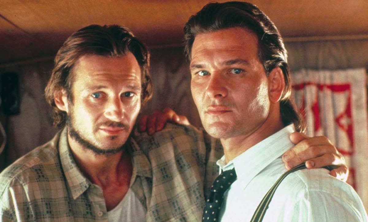 Liam Neeson and Patrick Swayze in "Next of Kin" (1989)<p>Warner Bros.</p>