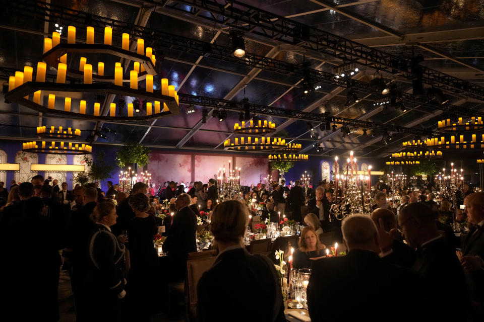 Guests stand during the state dinner.