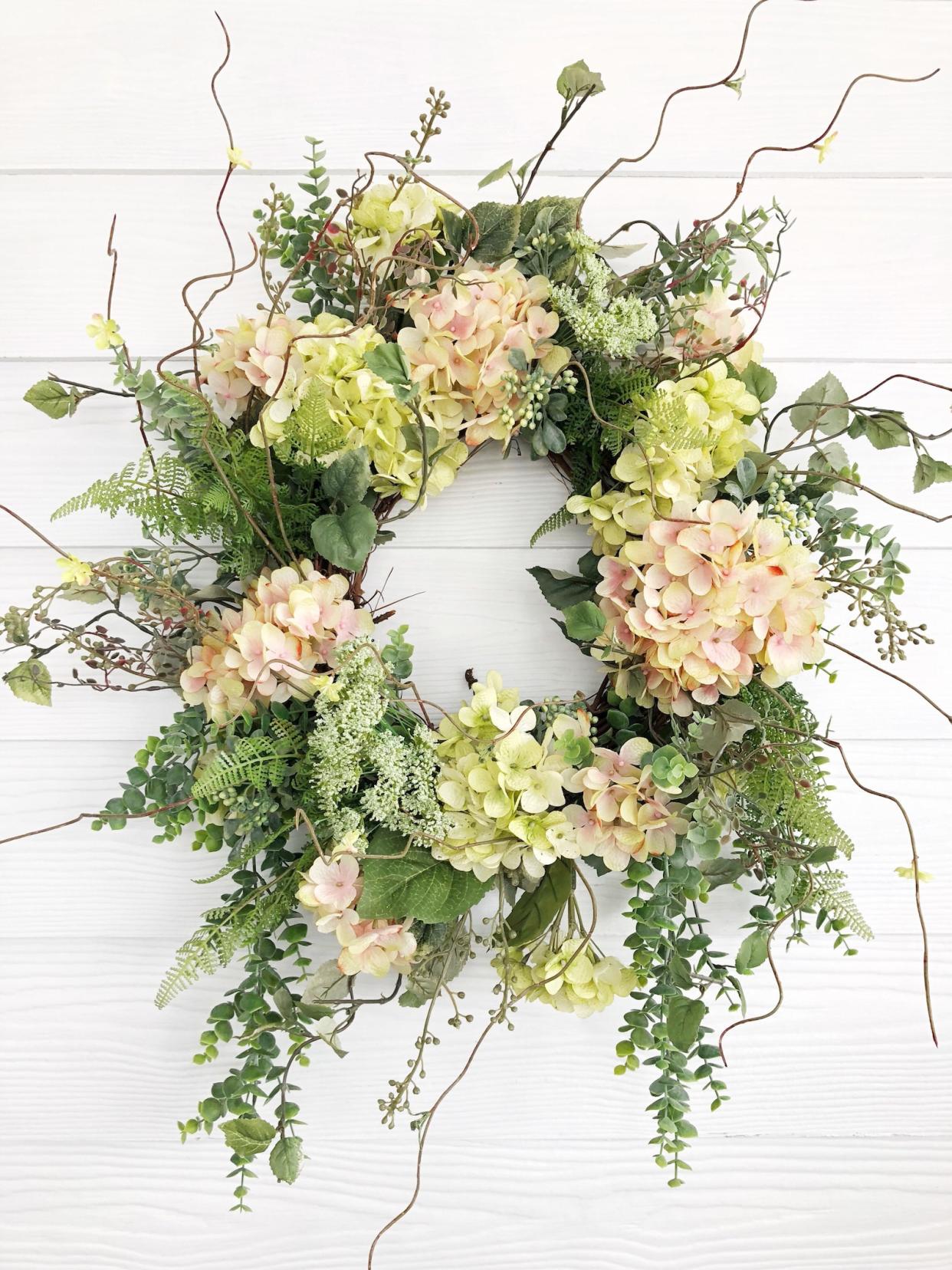 <p><a href="https://clicks.trx-hub.com/xid/hearstcorp_9eb67_edc?q=https%3A%2F%2Fwww.etsy.com%2Flisting%2F590687828%2Fspring-wreath-summer-wreath-pink-and&p=https%3A%2F%2Fwww.elledecor.com%2Fshopping%2Fg21206683%2Fsummer-wreaths%2F&utmSource=yahoo-us&utmCampaign=59&utmMedium=syn" rel="nofollow noopener" target="_blank" data-ylk="slk:Shop Now;elm:context_link;itc:0;sec:content-canvas" class="link rapid-noclick-resp">Shop Now</a></p><p>Pink and Green Hydrangea Wreath</p><p>etsy.com</p><p>$215.00</p>