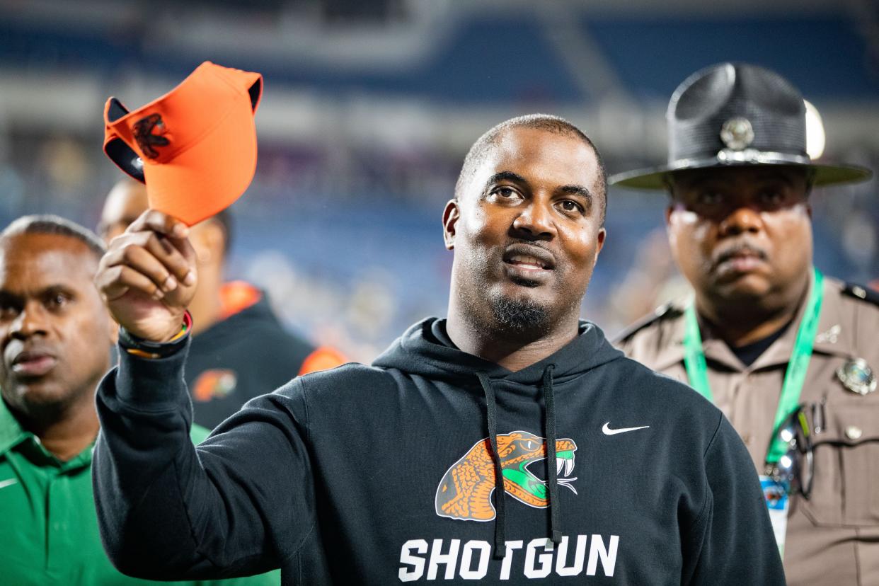 Florida A&M Rattlers head coach Willie Simmons celebrates his team’s victory over the Bethune Cookman Wildcats at Camping World Stadium on Saturday, Nov. 18, 2023.