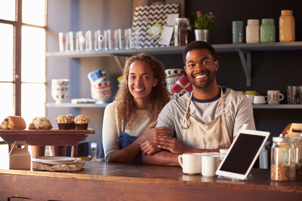 Small business owners in their coffee shop