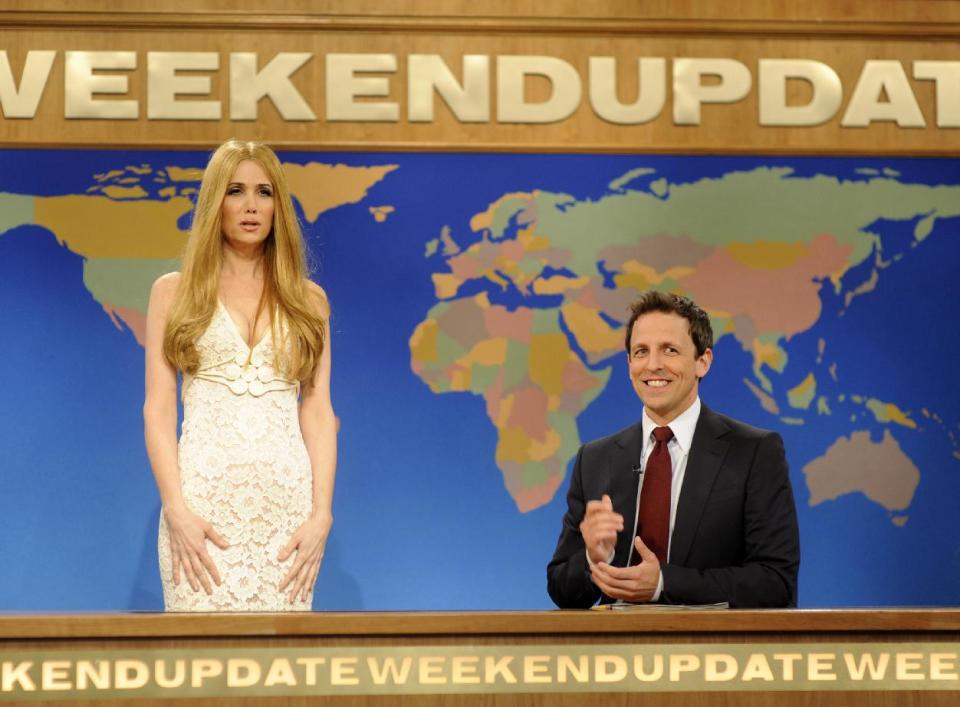 This image released by NBC shows Kristen Wiig, portraying singer Lana Del Rey, left and Seth Meyers during a skit from "Saturday Night Live." Wiig was nominated for an Emmy award on Thursday, July 19, 2012 for her various roles on "Saturday Night Live." The 64th annual Primetime Emmy Awards will be presented Sept. 23 at the Nokia Theatre in Los Angeles, hosted by Jimmy Kimmel and airing live on ABC. (AP Photo/NBC,Dana Edelson)