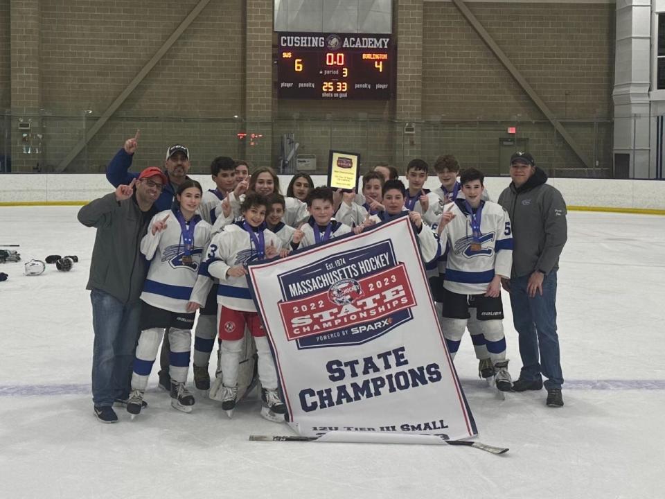 Members of the Chiefs U12 'A' co-ed youth hockey team after winning the state championship.