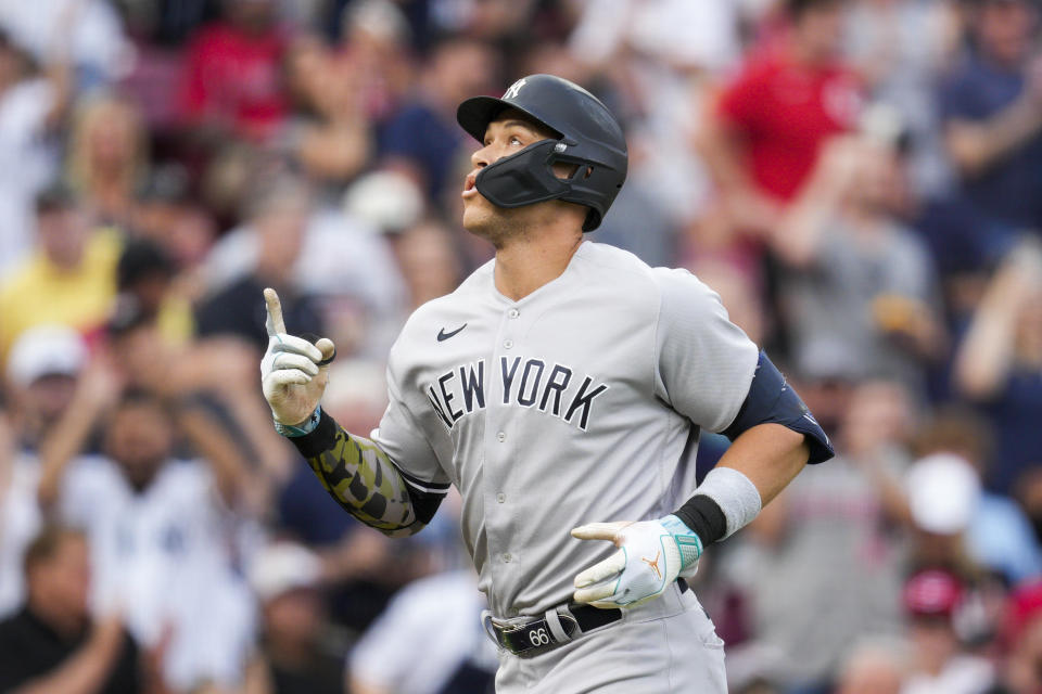 New York Yankees' Aaron Judge runs the bases after hitting a solo home run against the Cincinnati Reds during the first inning of a baseball game in Cincinnati, Friday, May 19, 2023. (AP Photo/Jeff Dean)