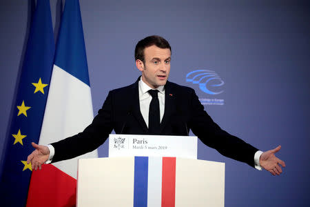 FILE PHOTO: French President Emmanuel Macron delivers a speech during the closing session of the Intelligence College in Europe meeting at the Foreign Affairs Ministry in Paris, France March 5, 2019. Ludovic Marin/Pool via REUTERS/File Photo