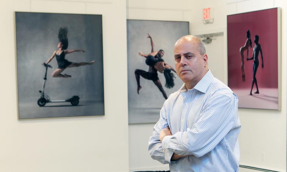 Steven Vandervelden is a former Westchester prosecutor who didn't become a defense lawyer, or go into security, or teach evidence classes in law school. he became a fairly renowned dance photographer and he's exhibiting his work at Pound Ridge library's Schaffner Gallery through the end of the year. 2023. He is photographed with some of his photos at the gallery Nov. 30, 2023.