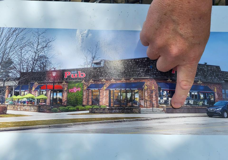 Jim Tavano, a partner in Hamlin Pub's developing St. Clair site, points to the kind of windows they'll have that will allow people to walk out to their exterior seating on Thursday, June 29, 2023.