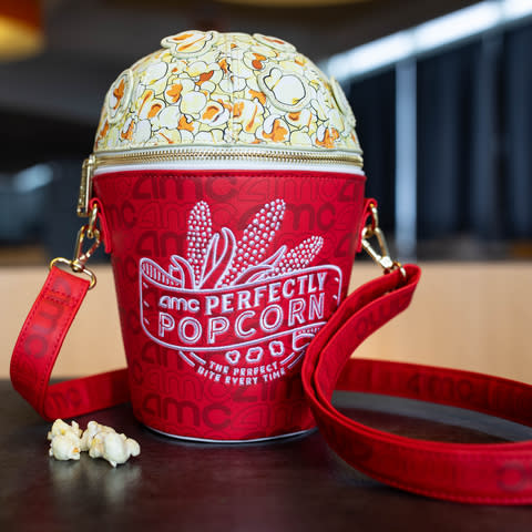 On National Popcorn Day - Friday, January 19 - AMC moviegoers can enjoy unlimited free refills on any size popcorn. Guests can also purchase an exclusive, limited edition AMC Loungefly popcorn crossbody bag, sold in theatres while supplies last. (Photo: Business Wire)