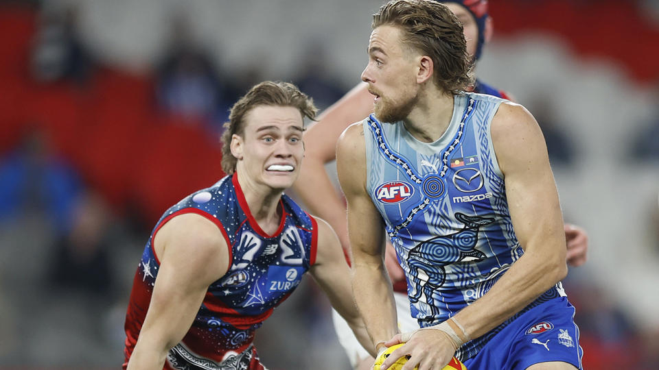 North Melbourne impressed in the first half against the Demons, but the reigning premiers proved too much to handle. (Photo by Mike Owen/AFL Photos/via Getty Images)