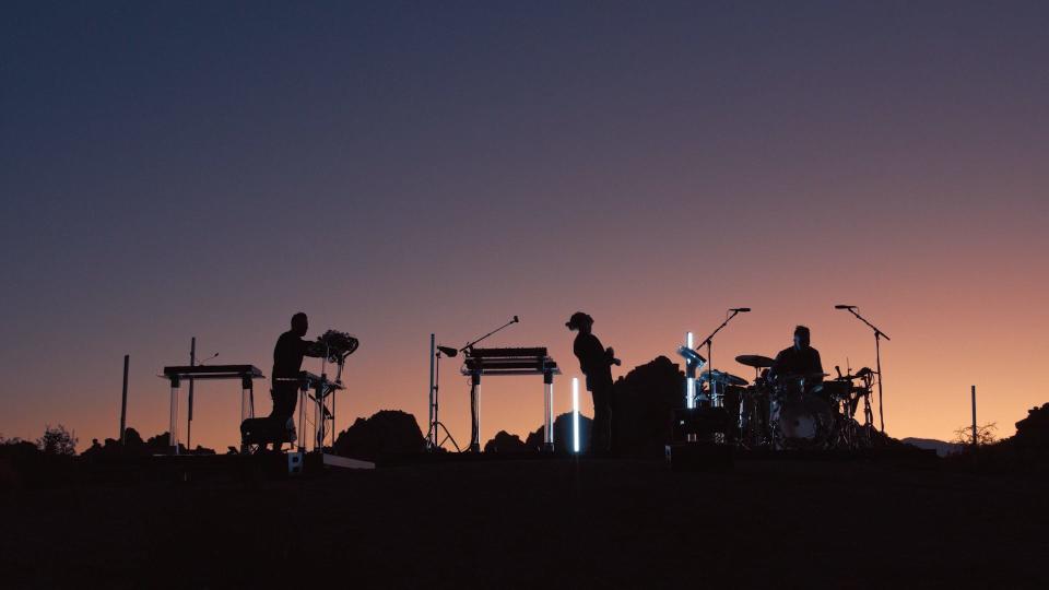 Rüfüs Du Sol performing in Joshua Tree