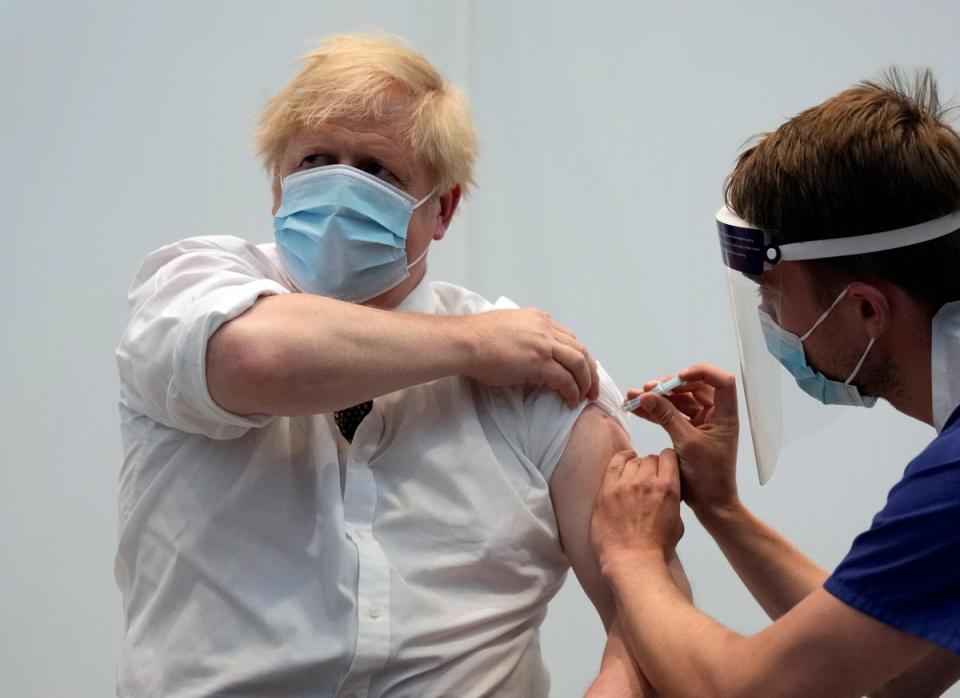 Boris Johnson getting vaccinated post-jig (PA)