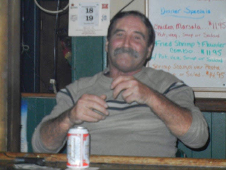 John Dugan, affectionately called "Dugan" by friends, in his element at O'Fowley's neighborhood bar in Croydon.