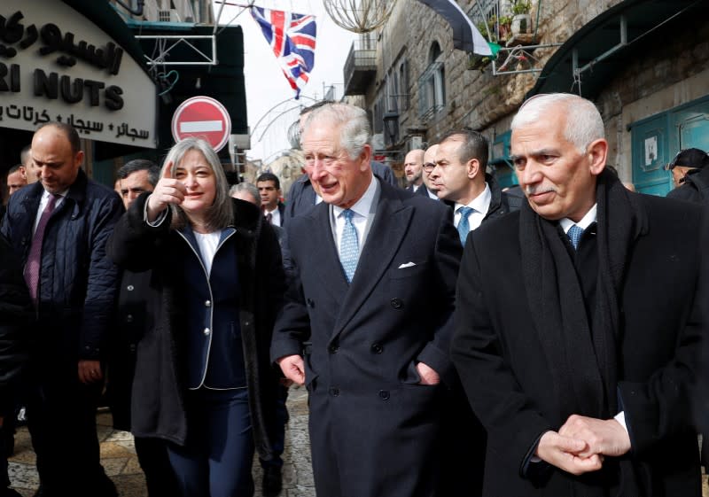 Britain's Prince Charles arrives to visit Omar mosque in Bethlehem in the Israeli-occupied West Bank