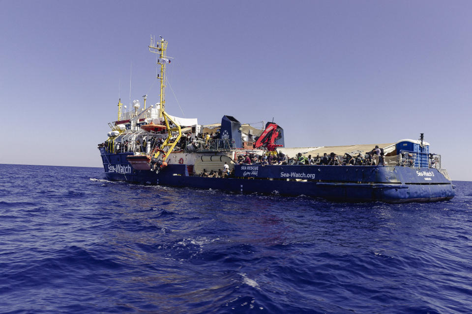 The German charity Sea-Watch 3 with 444 people on board in the central Mediterranean on Sunday, July 24, 2022. Ships in the Mediterranean Sea have rescued over 1,100 people struggling to reach Europe in rickety smugglers boats and found five bodies. The Italian Coast Guard says Sunday that Italian vessels recovered the bodies Saturday as it rescued 674 people packed on a fishing boat adrift in the Mediterranean off the Libyan coast. (Nora Boerding/Sea-Watch via AP)