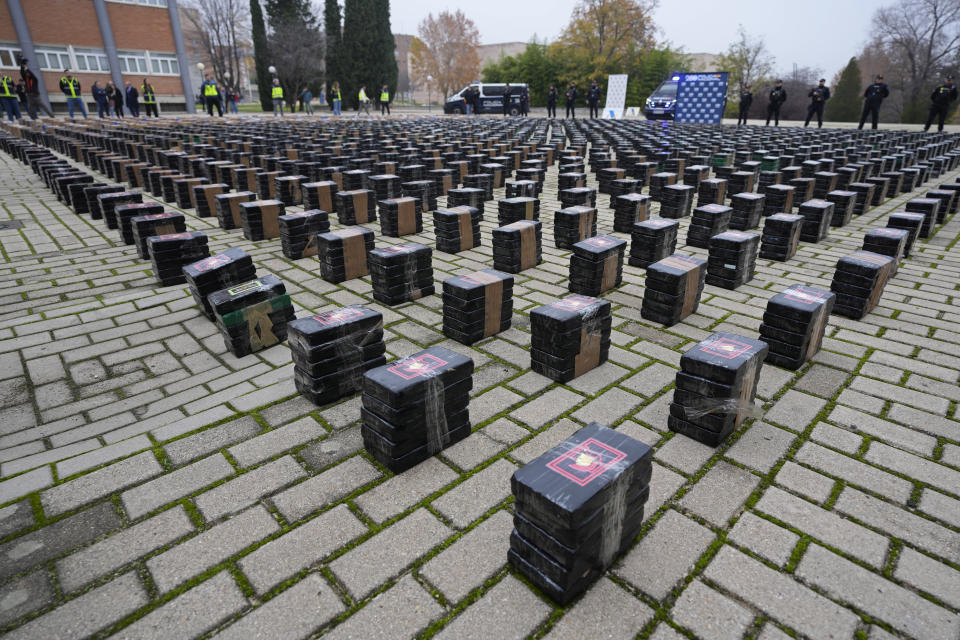 Part of a haul of 11 tons of cocaine is displayed in the patio of a police station in Madrid, Spain, Tuesday, Dec. 12, 2023. Spanish authorities say that they have confiscated 11 tons of cocaine and arrested 20 people in two different operations against the smuggling of the illegal drugs inside shipping containers. Investigators believe that the criminal organization was using a frozen seafood company as a front to bring the drug from South America.(AP Photo/Paul White)