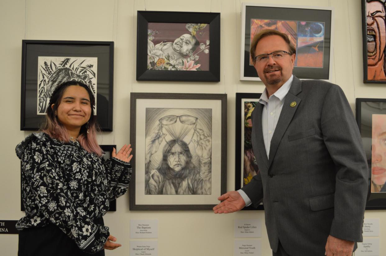 Congressman Chuck Edwards (NC-11) poses with Henderson County Early College 2023 graduate Briana Sosa-Trejo, who was named the winner of the 2023 Congressional Art Competition. Sosa-Trejo's work will be on display at the U.S. Capitol for a year.