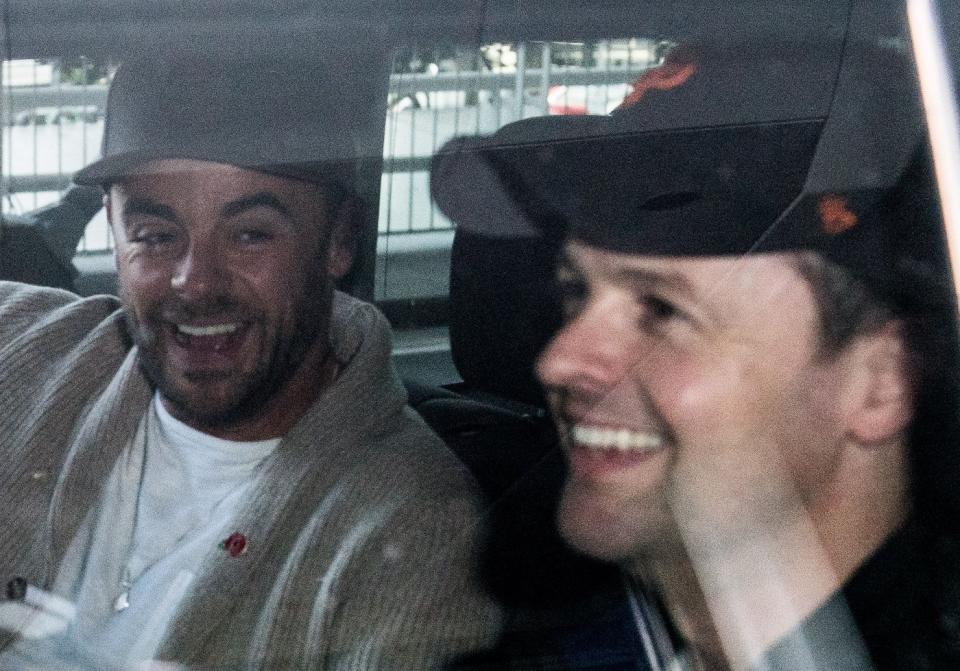 The pair grinned as they got into a waiting car. Copyright: [Rex]