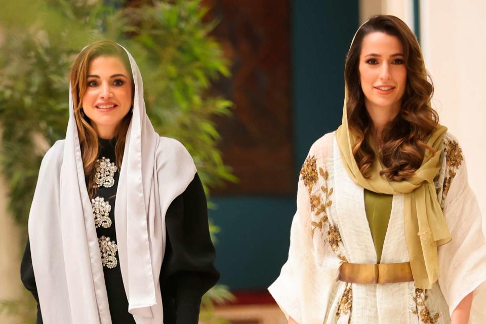 <p>Royal Hashemite Court / Albert Nieboer/picture-alliance/dpa/AP Images</p> Queen Rania of Jordan (left) and daughter-in-law Rajwa in Amman in 2022.