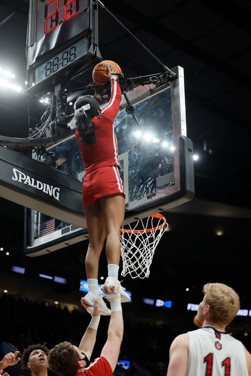 Mar 17, 2022; Portland, OR, USA; Indiana Hoosiers cheerleaders retrieve the basketball against the Saint Mary's Gaels during the second half during the first round of the 2022 NCAA Tournament at Moda Center.