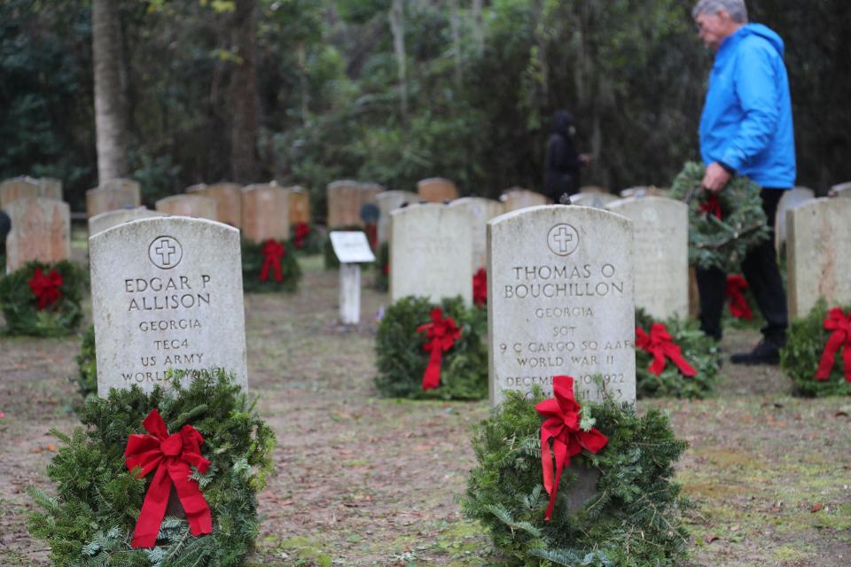 Wreaths were placed on more than 100 veteran's graves during the National Wreaths Across America Day ceremony on Saturday, December 16, 2023 at Bonaventure Cemetery.