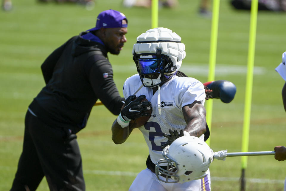 Minnesota Vikings running back Alexander Mattison (2) works out during NFL football training camp Monday, July 31, 2023, in Eagan, Minn. (AP Photo/Craig Lassig)