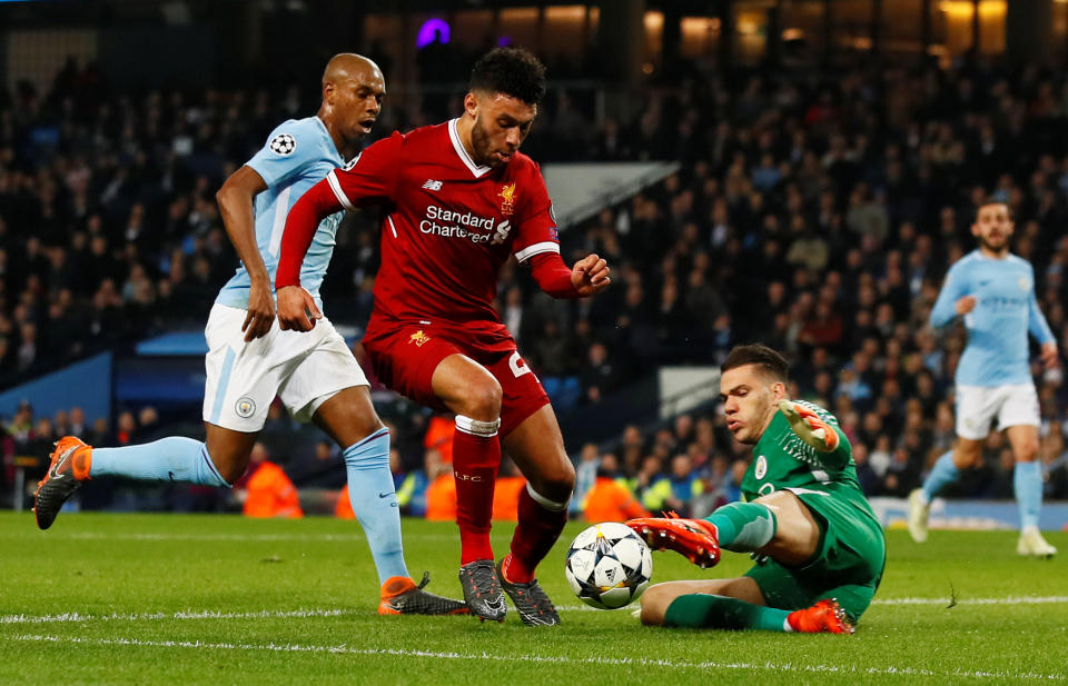 <p>Soccer Football – Champions League Quarter Final Second Leg – Manchester City vs Liverpool – Etihad Stadium, Manchester, Britain – April 10, 2018 Liverpool’s Alex Oxlade-Chamberlain rounds Manchester City’s Ederson before missing a chance Action Images via Reuters/Jason Cairnduff </p>