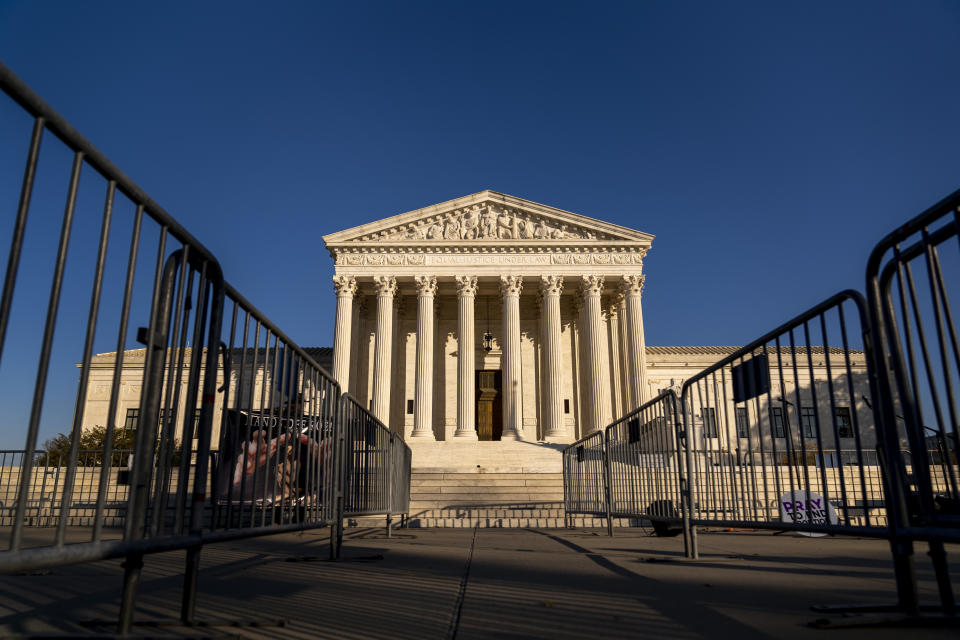 Barriers to separate activists are set up outside of the Supreme Court in Washington, Tuesday, Nov. 30, 2021, ahead of arguments on abortion at the court in Washington.(AP Photo/Andrew Harnik)