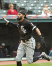 Chicago White Sox's Billy Hamilton celebrates after scoring on a steal against the Cleveland Indians during the eighth inning inning of a baseball game in Cleveland, Sunday, Sept. 26, 2021. (AP Photo/Phil Long)