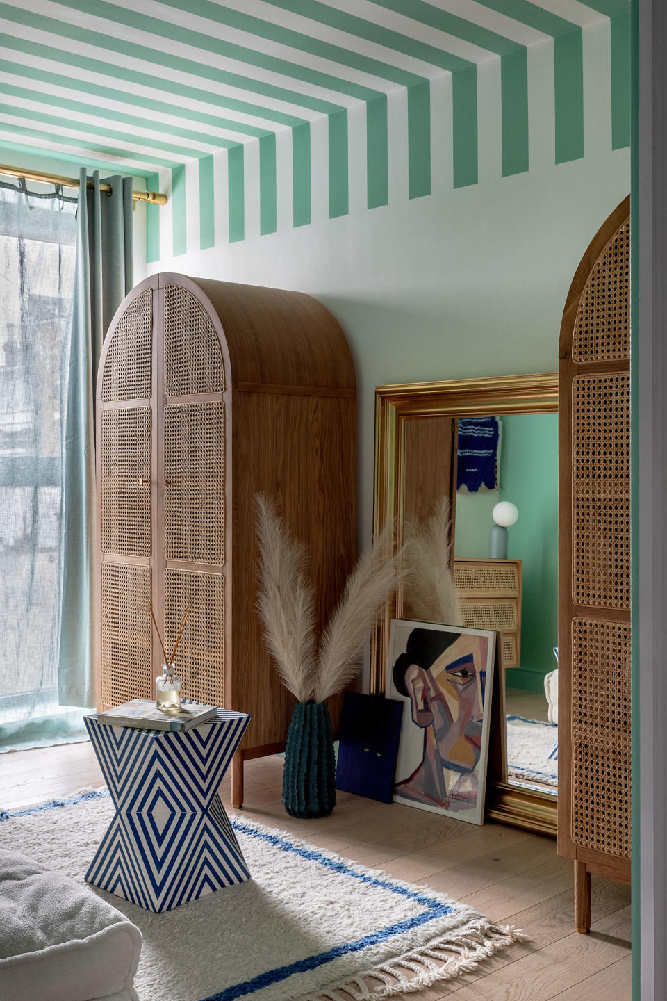 a room with a painted stripe ceiling