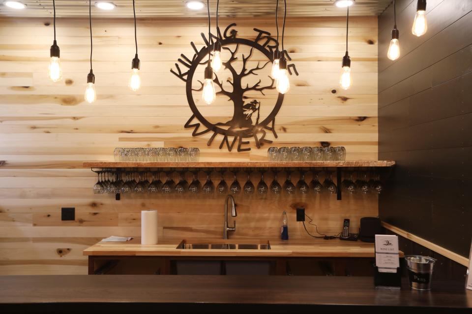 The logo of Killing Tree Winery above the tasting room bar. The dried flower pumpkin class will be held Thursday at 6 p.m.