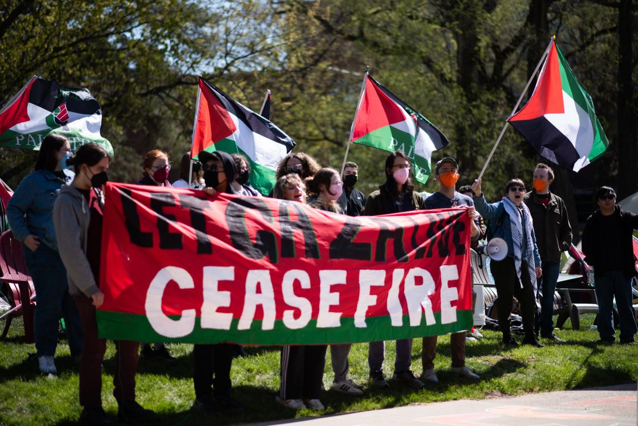 Michigan State University students and others demonstrate Thursday, April 25, 2024, joining students on college campuses across the U.S. calling for their schools to divest from Israel amid the ongoing war in Gaza.