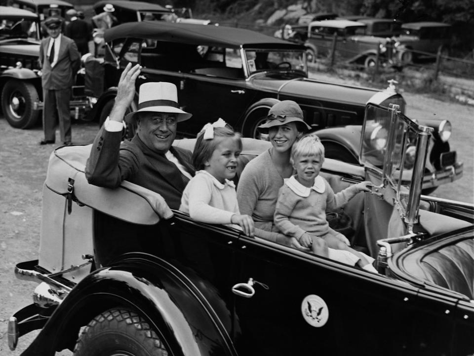Franklin D. Roosevelt with his daughter Anna, granddaughter, Anna, and grandson, Curtis.