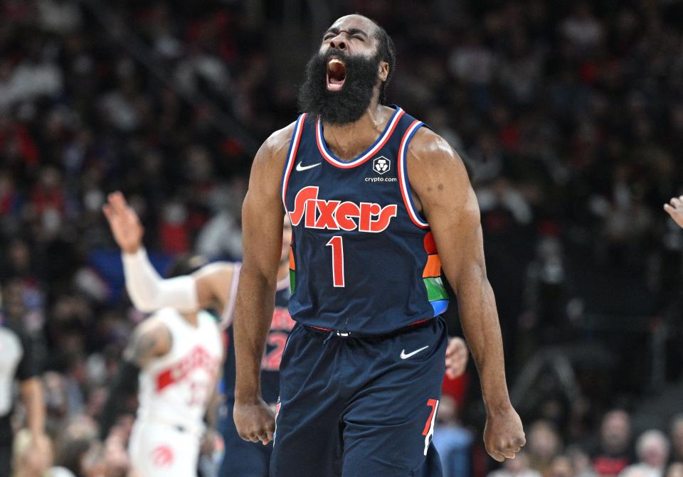 Philadelphia 76ers guard James Harden (1) reacts after making a basket against the Toronto Raptors during the first round for the 2022 NBA playoffs at Scotiabank Arena.