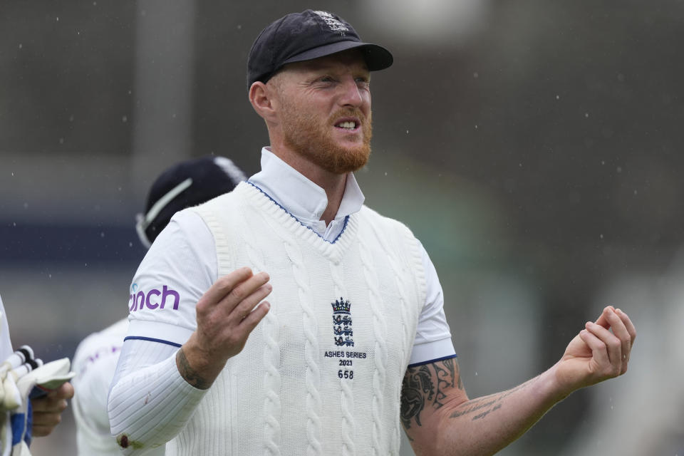 England's captain Ben Stokes leaves the pitch as rain stops play on day four of the fifth Ashes Test match between England and Australia, at The Oval cricket ground in London, Sunday, July 30, 2023. (AP Photo/Kirsty Wigglesworth)