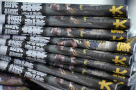 Copies of Apple Daily are seen at a newspaper stand at a downtown street in Hong Kong Friday, June 18, 2021. The pro-democracy paper increased its print run to 500,000 copies on Friday, a day after police arrested five top editors and executives and froze $2.3 million in assets linked to the media company. (AP Photo/Vincent Yu)