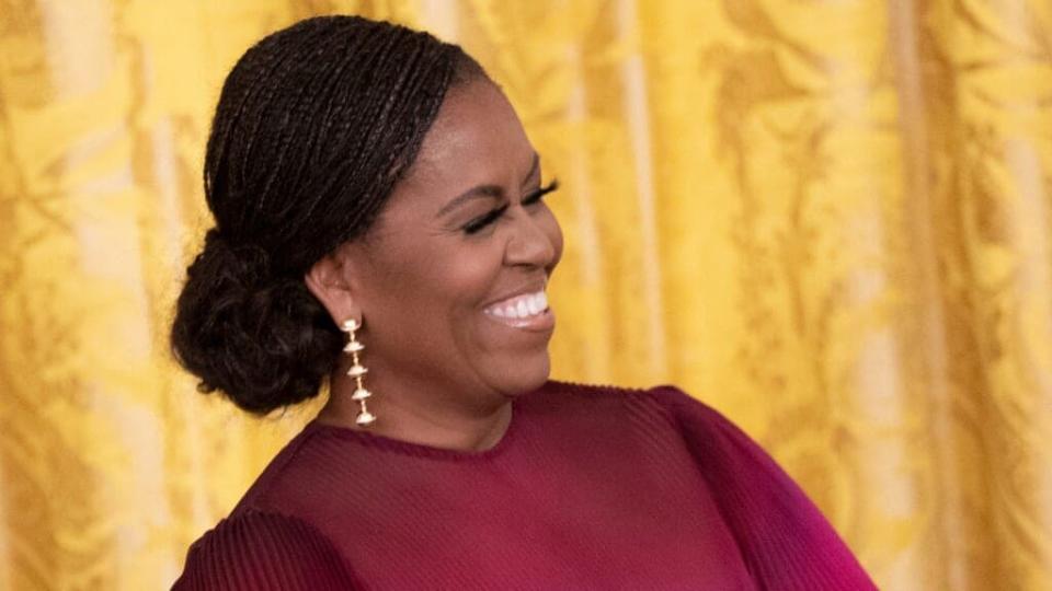 Former First Lady Michelle Obama wears a braided style at the unveiling of the Obamas’ official White House portraits at the White House on September 7, 2022, in Washington, DC. <br>(Photo by Kevin Dietsch/Getty Images)