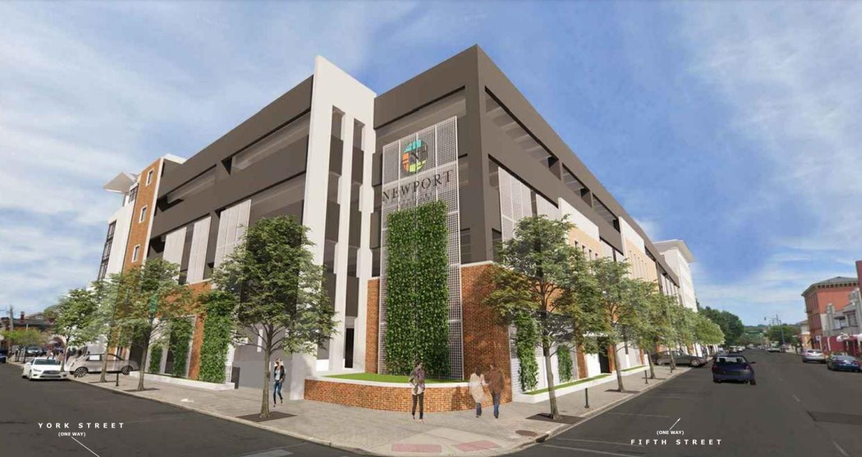 Two new hotels, office space and a city-owned parking garage will go up at the current site of the World Peace Bell in Newport. On Friday, city commissioners approved the plan, which has been five years in the making.