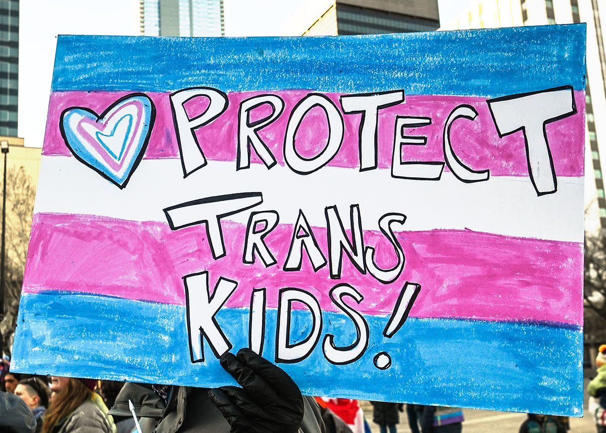 edmonton, canada february 11protestors during a rally at churchill square in support of trans youth in alberta following the 'sing with love' concert at mcdougall united church, on february 11, 2024, in edmonton, alberta, canadathe concert and rally, held in downtown edmonton on sunday afternoon, aimed to demonstrate solidarity with the trans community in response to recent government policies impacting trans children photo by artur widaknurphoto via getty images