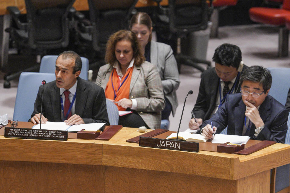 Japan's United Nations Ambassador Kimihiro Ishikane, right, listens as U.N. Assistant Secretary-General Khaled Khiari, left, address the U.N. Security Council meeting discussing a ballistic missile test by North Korea, Wednesday Oct. 5, 2022 at U.N. headquarters. (AP Photo/Bebeto Matthews)