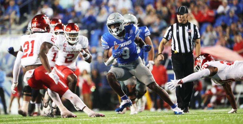 Memphis Tigers wide receiver Gabriel Rogers  advances up the field against the Houston Cougars on Oct. 7, 2022 at Simmons Bank Liberty Stadium in Memphis.