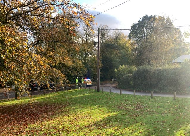 A police car at the scene on Stock Road in Essex after two children were struck by a vehicle during the school run