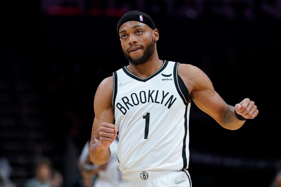 Brooklyn Nets forward Bruce Brown celebrates after scoring against the Charlotte Hornets during the first half of an NBA basketball game on Tuesday, March 8, 2022, in Charlotte, N.C. (AP Photo/Chris Carlson)