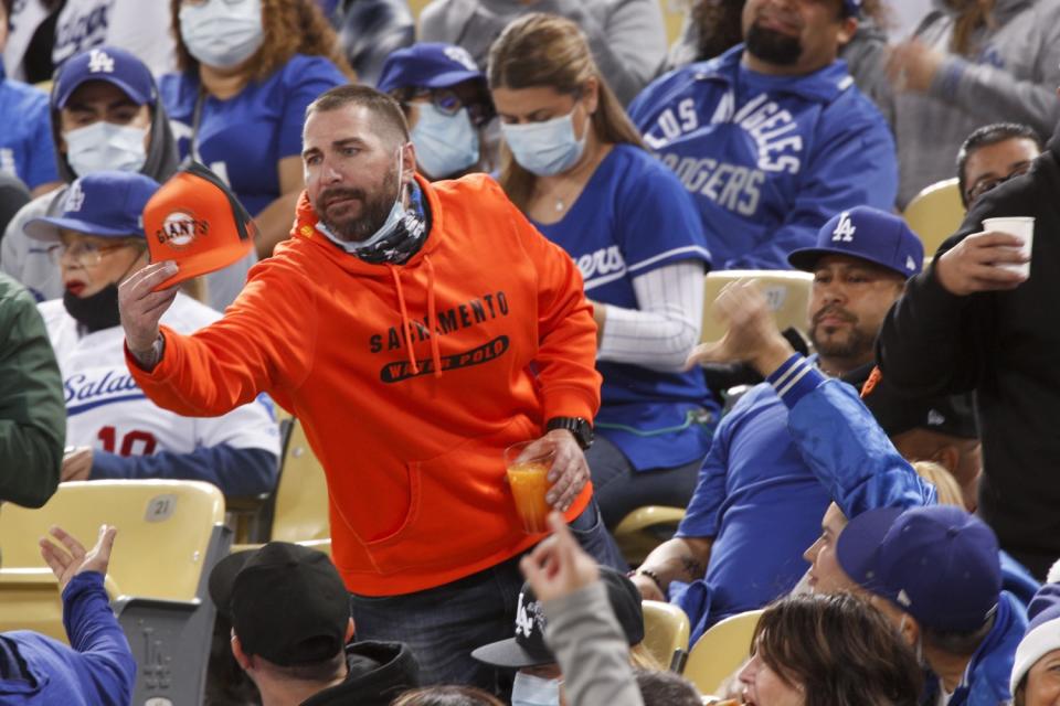 A Giants fan shows his support for his team.