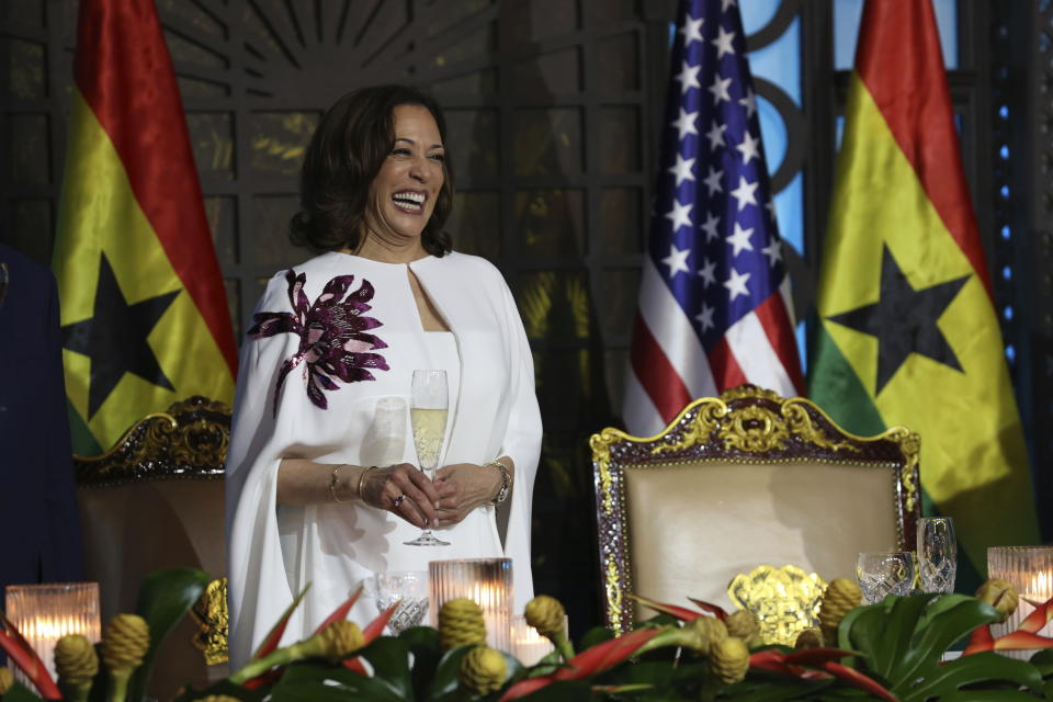 U.S. Vice President Kamala Harris laughs during a state banquet in Accra, Ghana, Monday, March 27, 2023. Harris is on a seven-day African visit that will also take her to Tanzania and Zambia. (AP Photo/Misper Apawu)