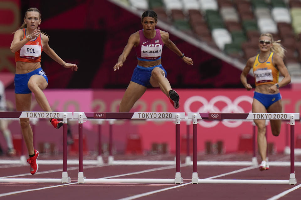 Sydney McLaughlin, of the United States, wins the women's 400-meter hurdles final at the 2020 Summer Olympics, Wednesday, Aug. 4, 2021, in Tokyo, Japan. (AP Photo/Petr David Josek)