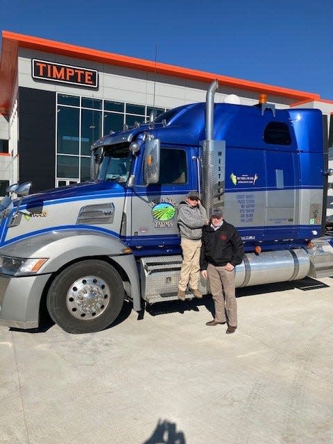 Dan, right, is a member of Owner Independent Driver’s Association. He's seen here with his grandson Daniel.