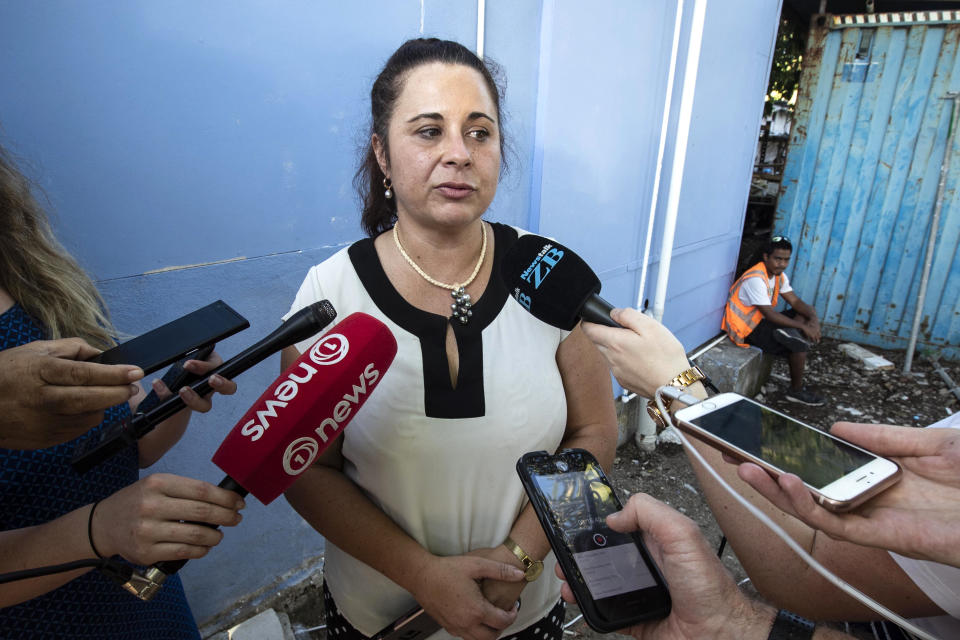 Television New Zealand journalist Barbara Dreaver speaks to the media after she was released by Nauru Police in Nauru, Tuesday, Sept. 4, 2018. Nauru police detained the journalist for about three hours and revoked her forum accreditation after she interviewed a refugee outside a local restaurant. (Jason Oxenham/Pool Photo via AP)