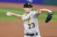 Pittsburgh Pirates starting pitcher Mitch Keller delivers against the Cleveland Indians during the first inning of a baseball game, Friday, Sept. 25, 2020, in Cleveland. (AP Photo/Ron Schwane)