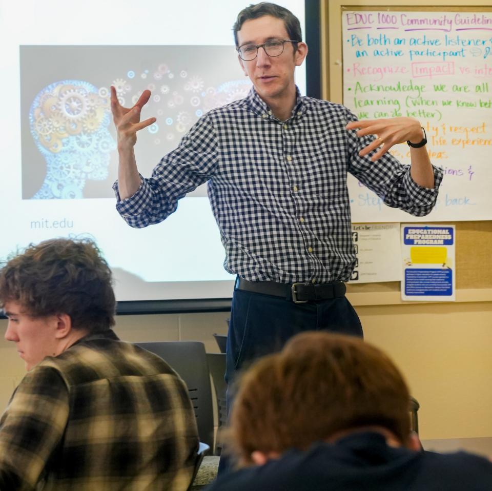 Gabriel Velez, an assistant professor in education at Marquette University, teaches students on Feb. 21, 2023. He is a developmental psychologist whose research focuses on youth identity. Velez is interested in how AI is changing the way students think about themselves. He is leading focus groups this semester to further explore the topic.