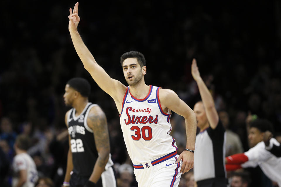 Philadelphia 76ers' Furkan Korkmaz signals after making a 3-pointer during the second half of the team's NBA basketball game against the San Antonio Spurs, Friday, Nov. 22, 2019, in Philadelphia. Philadelphia won 115-104. (AP Photo/Matt Slocum)